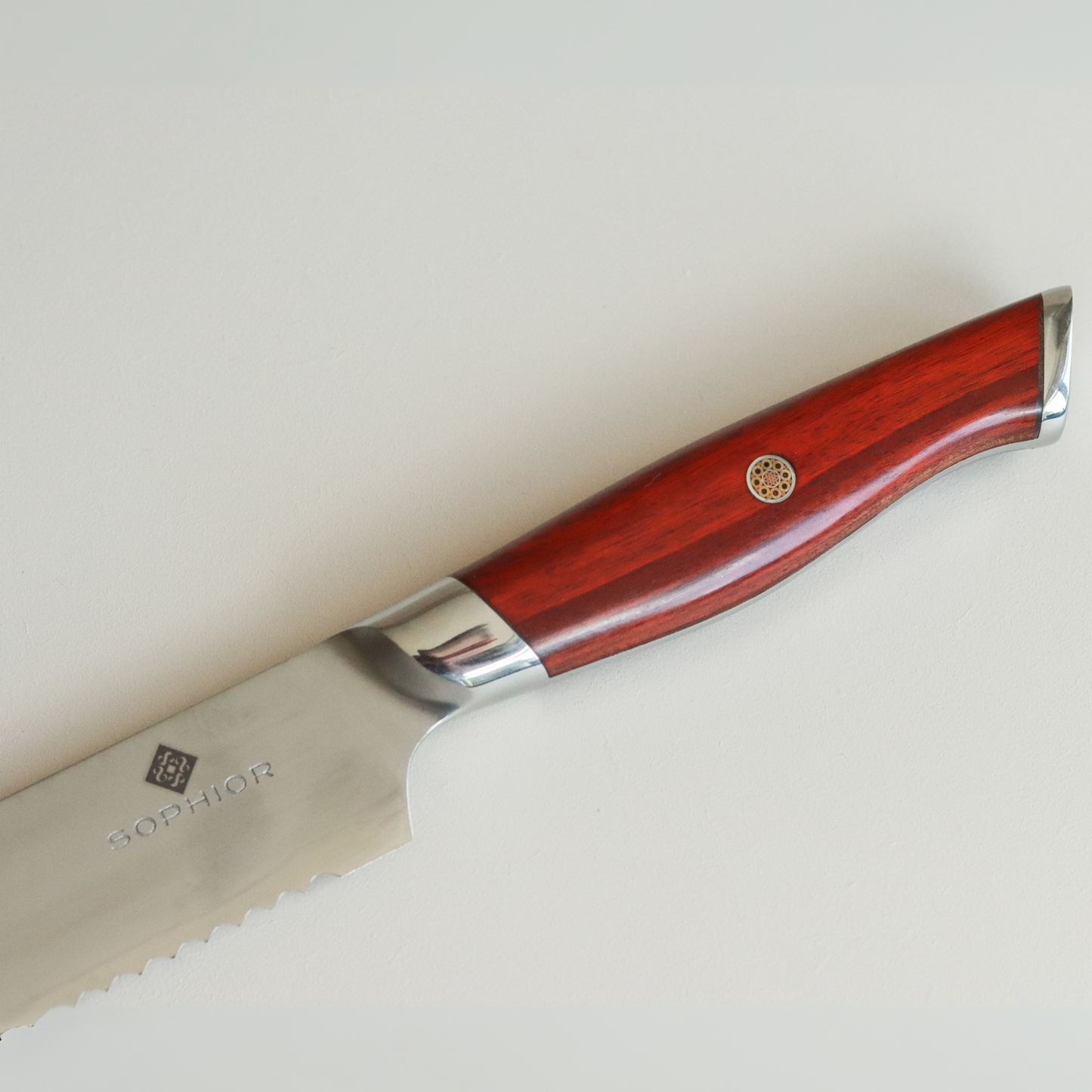 SOPHIOR Broodmes Classic Heritage detail van overgang lemmet naar rozenhouten handvat