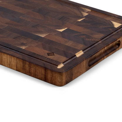 Houten Snijplank Acacia Kopshout 35x25x2,5 cm close-up van hoek met sapgroef en handgreep