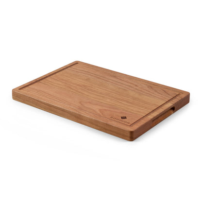 Houten Snijplank Kersen – 35×25×2,5 cm vanuit hoek met handgreep en kersenhout structuur