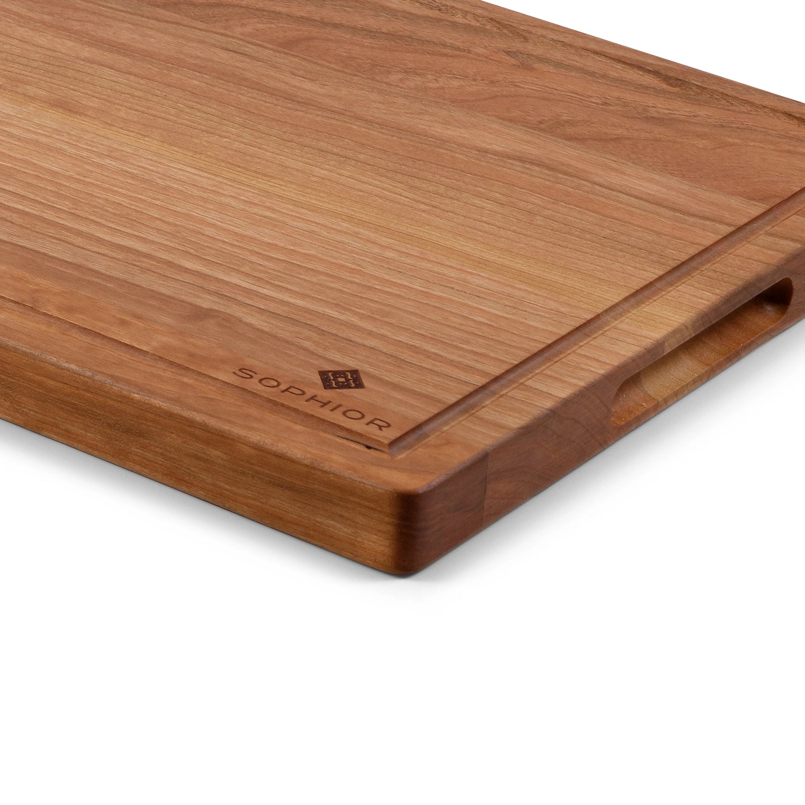Houten Snijplank Kersen – 42×30×2,5 cm close-up van rand en handvat-uitsparing