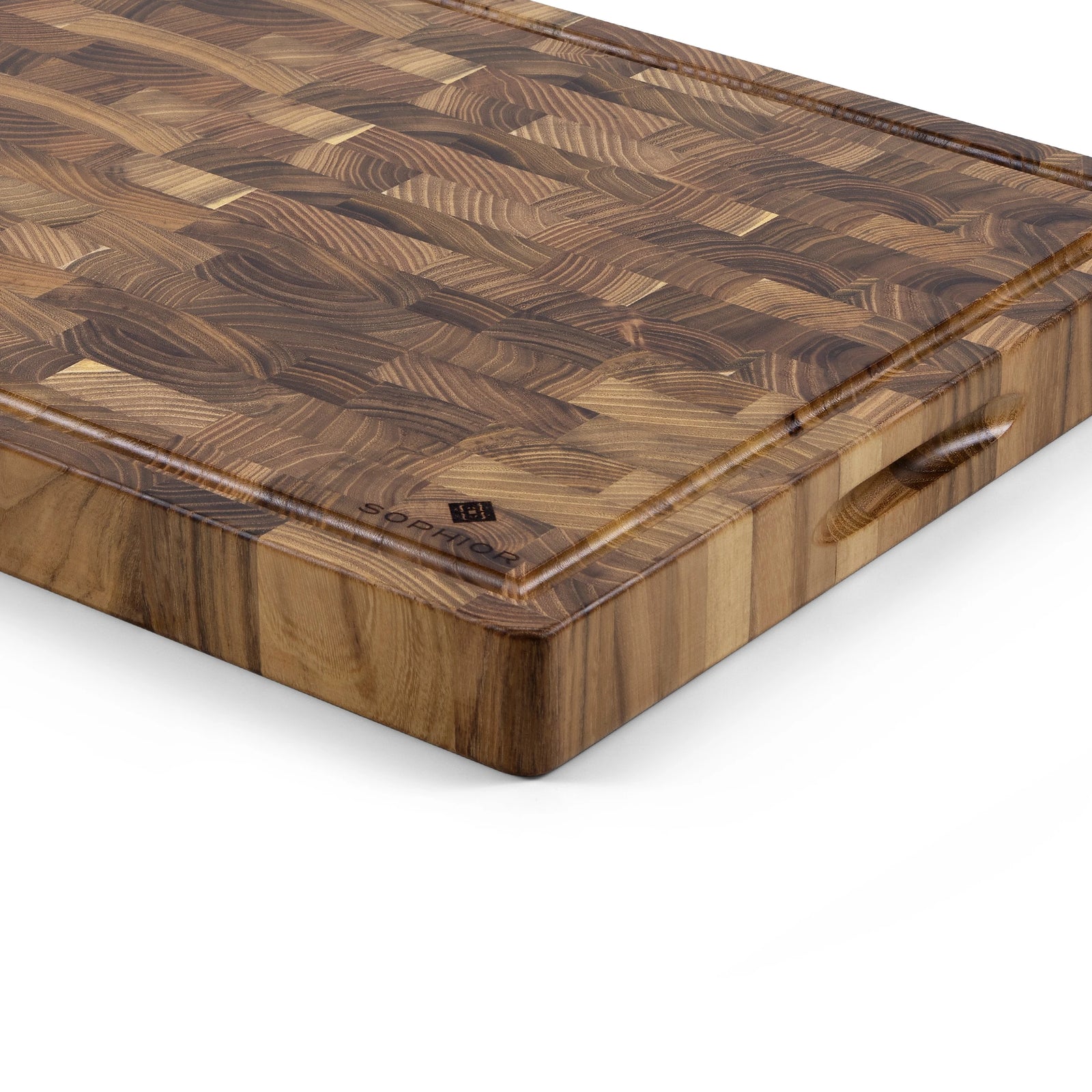 Houten Snijplank Teak Kopshout – 45×35×4 cm close-up van hoek met handgreep en sapgeul