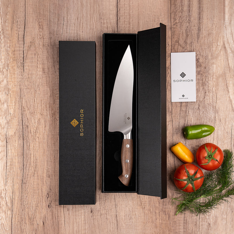 Koksmes 21 cm in zwarte geschenkverpakking met instructiekaart en verse groenten
